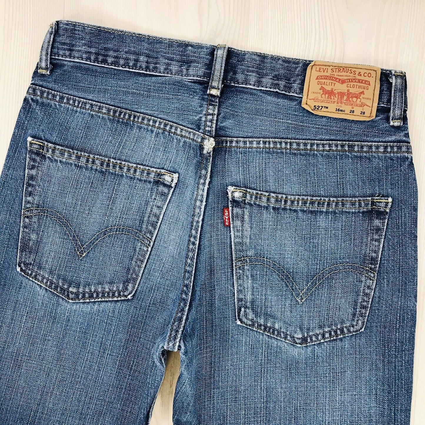 Vintage Levi's 527 Boys Blue Regular Bootcut Fit Ripped Jeans 16 Reg / W28 L28