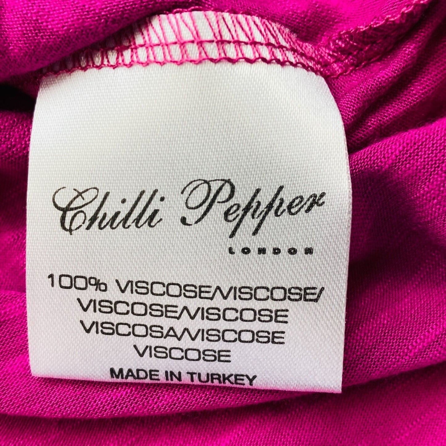 Chilli Pepper – Ärmelloses Neckholder-Jersey-Kleid in Magenta-Lila, figurbetont und ausgestellt, Größe L