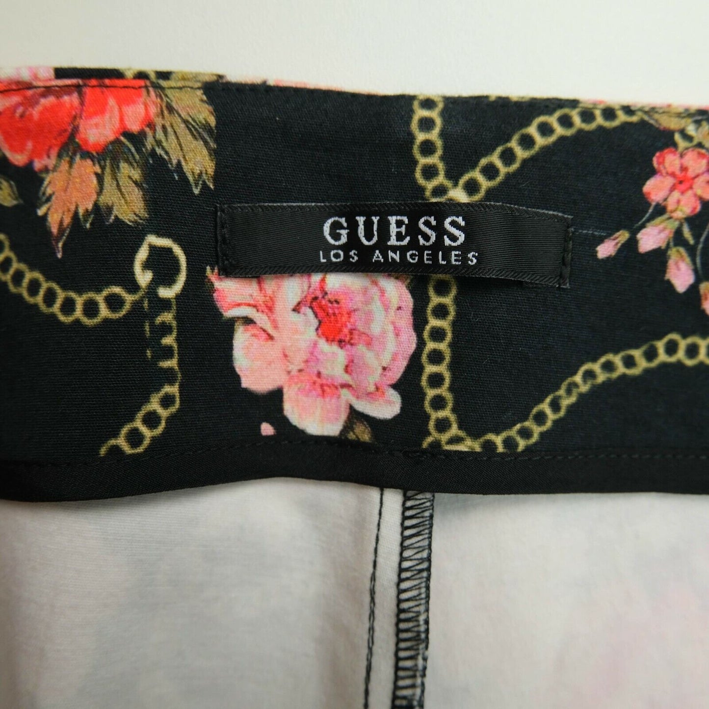 GUESS Schwarze Hose mit Blumendruck, Größe 38