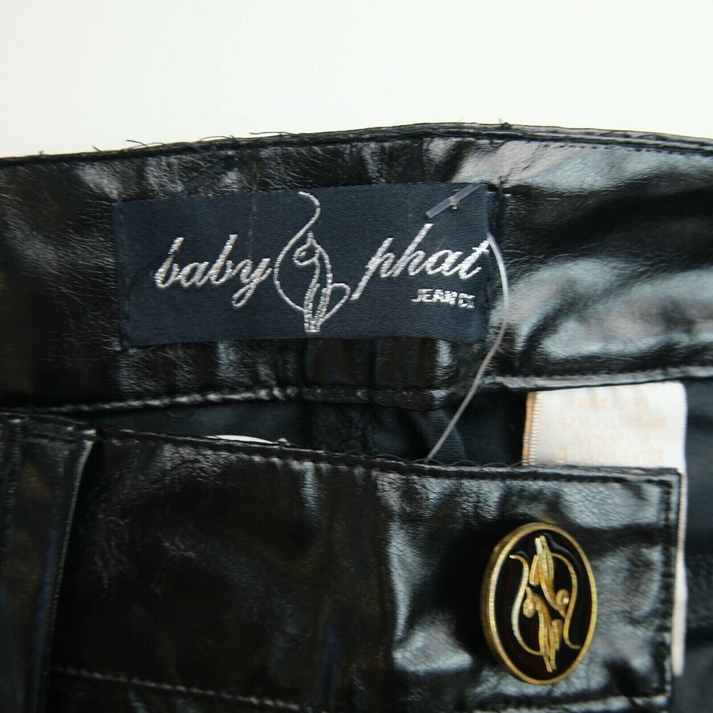 BABY PHAT Schwarze beschichtete Jeans für Damen mit normaler, konischer Beinform, Größe 7 – W30