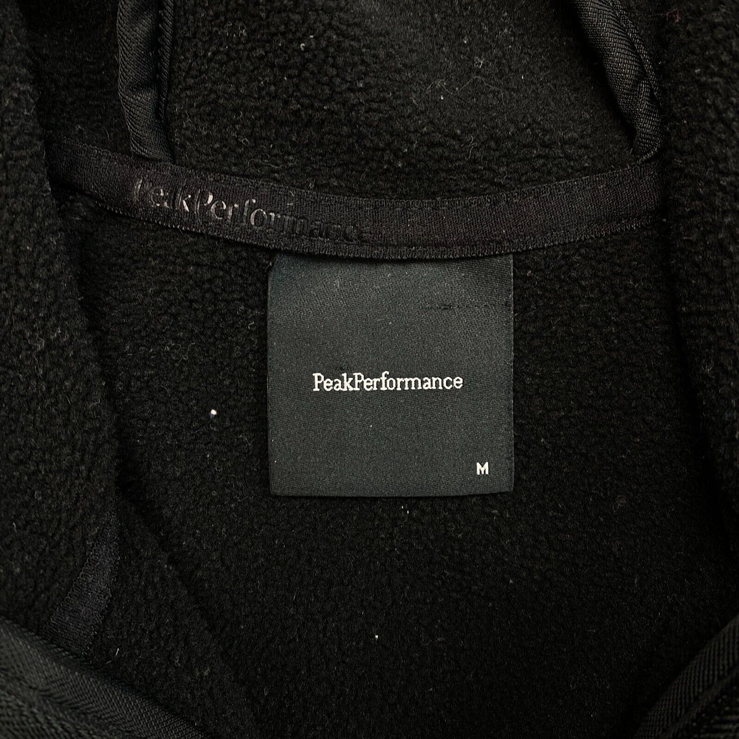 Peak Performance W Rider Pulloverjacke mit durchgehendem Reißverschluss und Kapuze, Schwarz, Größe M