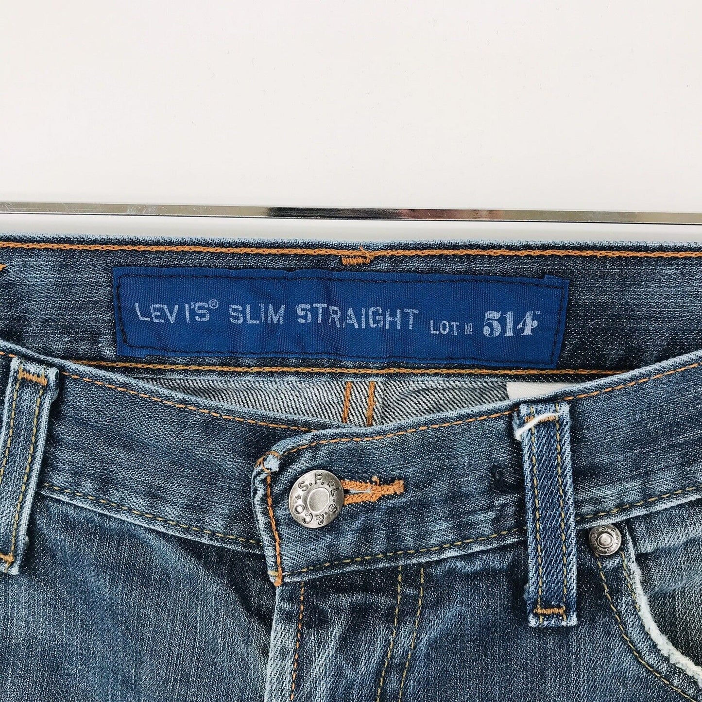 vintage Levi’s 514 Custom Made Blue Slim Straight Fit Short coupé W34