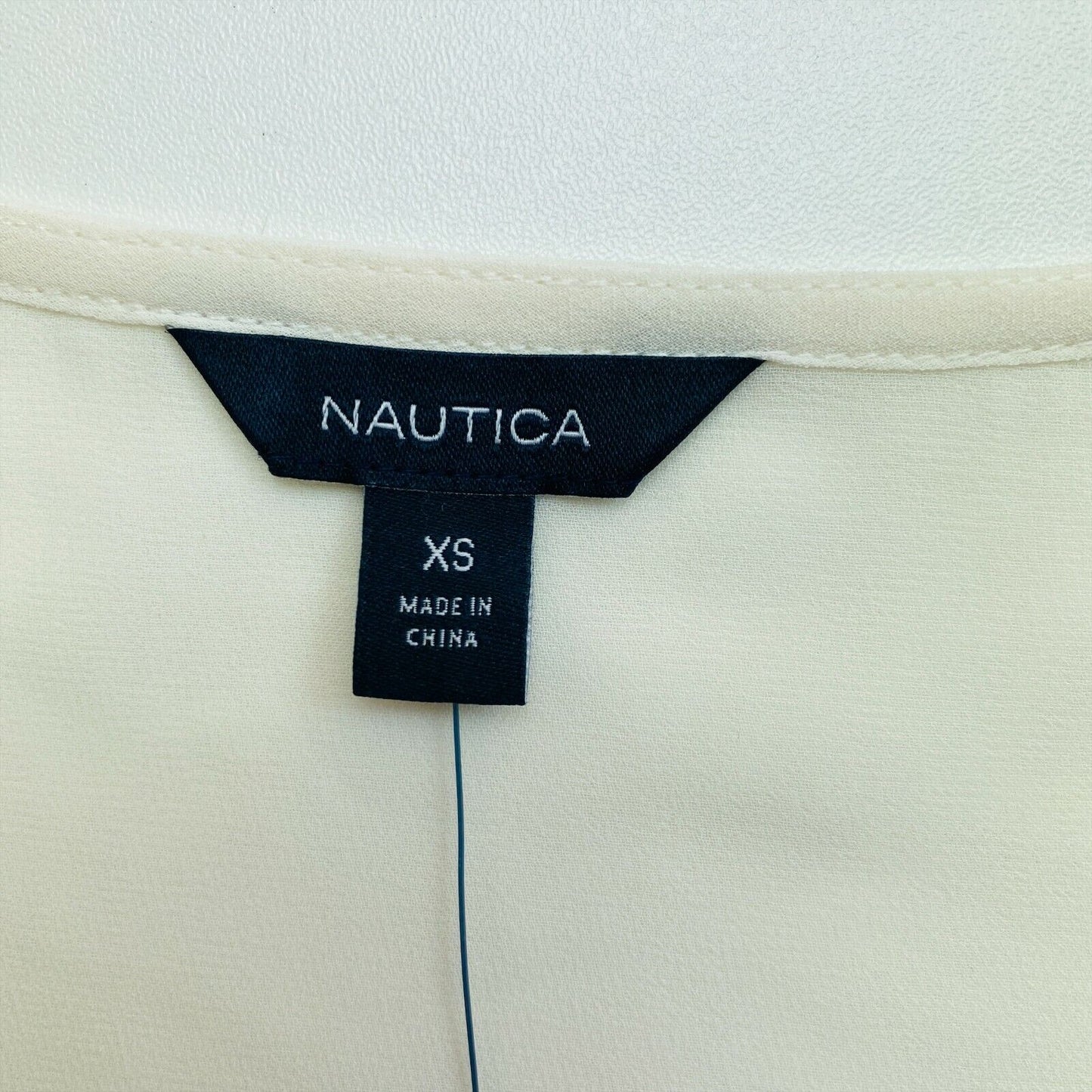 NAUTICA Beige ausgestelltes, ärmelloses Blusentop mit V-Ausschnitt, Größe XS